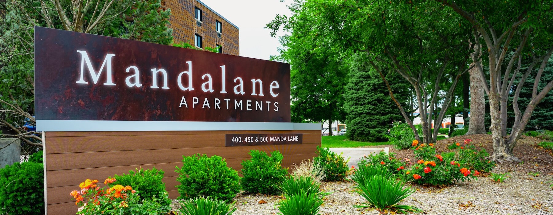 a sign in front of a building