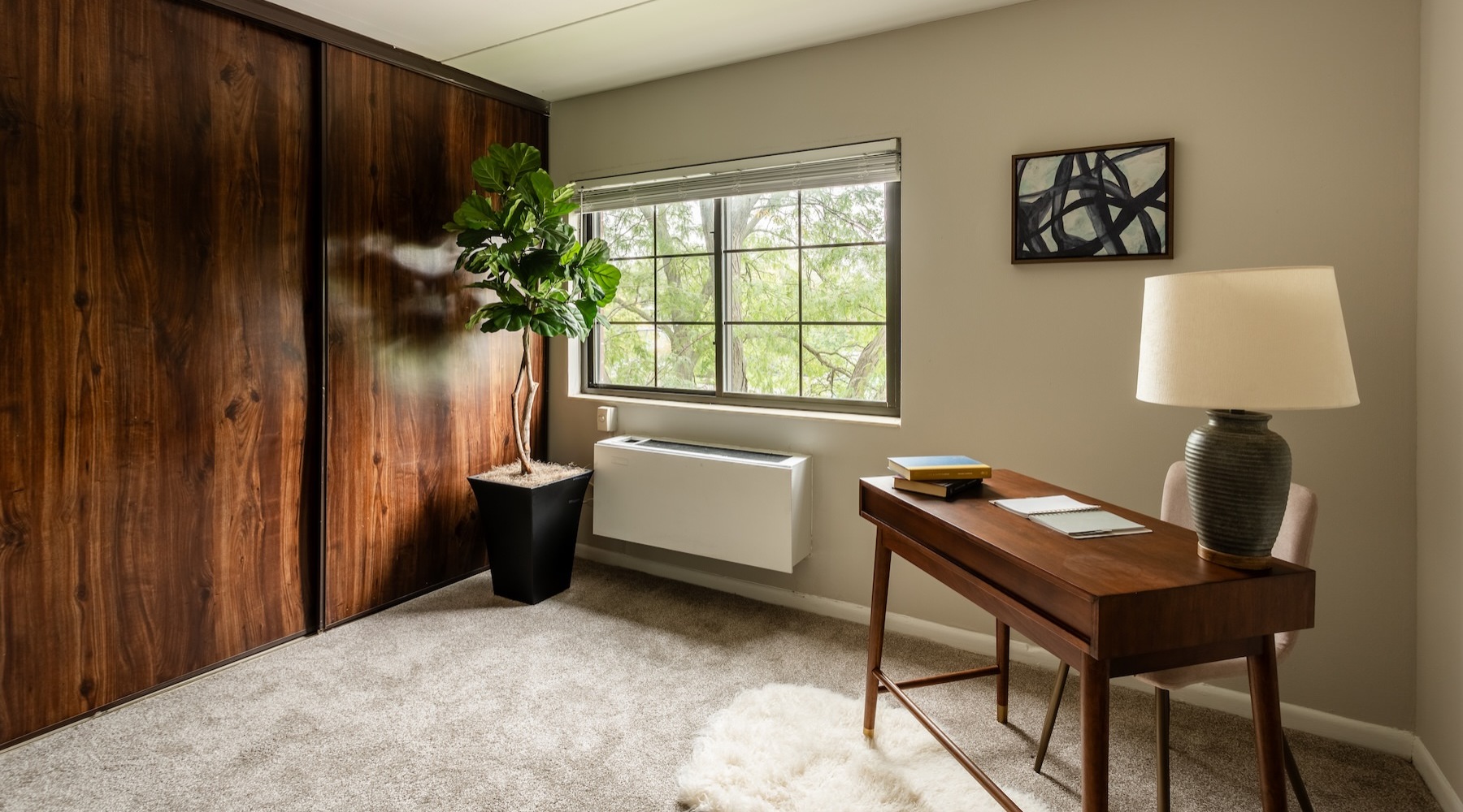 an office with a desk and a chair